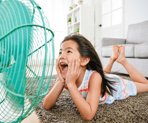 girl in front of a fan