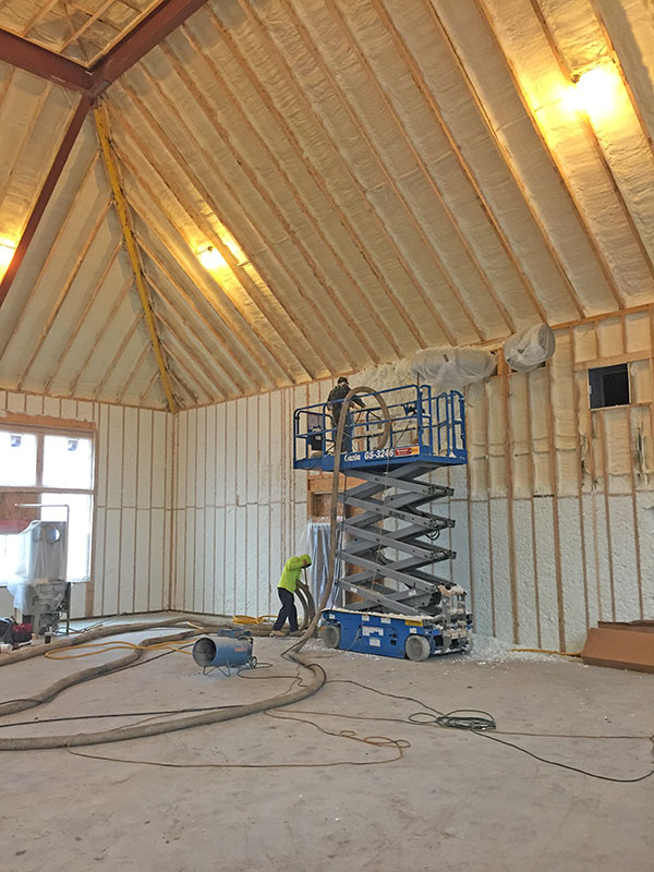 Spray foam insulation in sport court