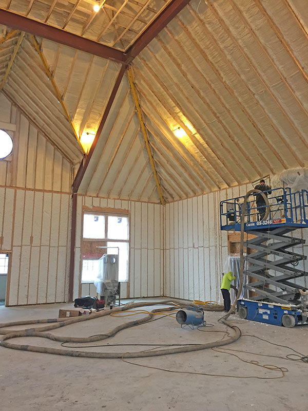 Spray foam insulation in sport court