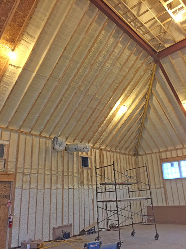 Spray foam insulation in sport court