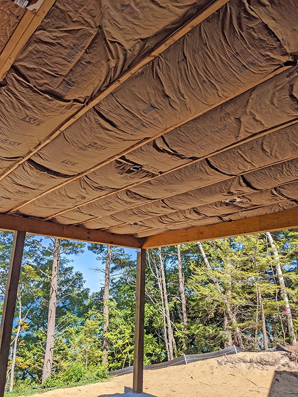 Fiberglass insulation in exterior sunroof flooring.