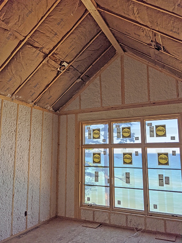 JM Spider and fiberglass insulation in new construction