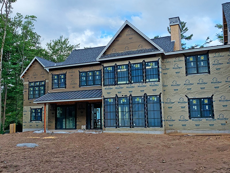 Exterior of custom home being built.