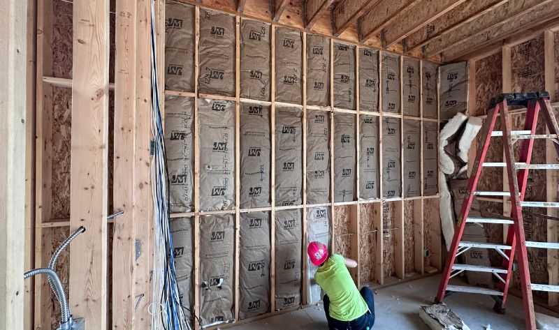 Batt insulation install at a wedding venue