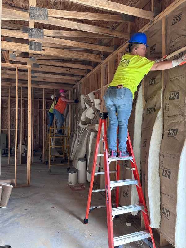 Batt insulation install at a wedding venue