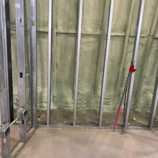 Spray foam insulation install inside airplane hanger