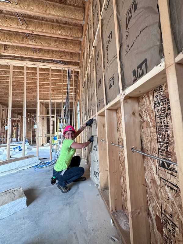 Batt insulation install at a wedding venue