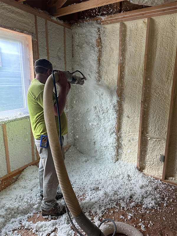 Hybrid insulation system in new residential construction